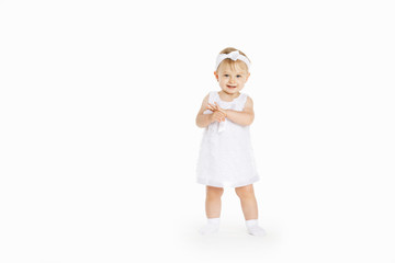 beautiful little girl all in white clothes
