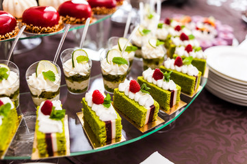 Candy bar. Candies table on the celebration party.