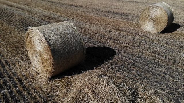 Nice aerial view of haystack on the field. Close up view on haystack