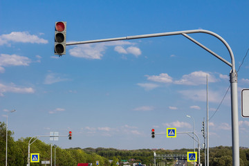 pedestrian crossing with traffic lights.