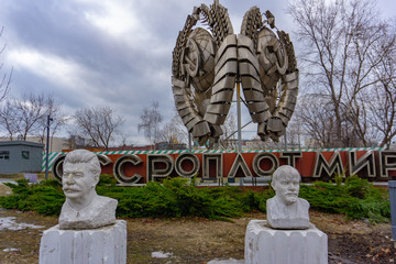 Moscow, Russia, May 29, 2019: Old communist statue of Lenin and Stalin in public green Gorky park