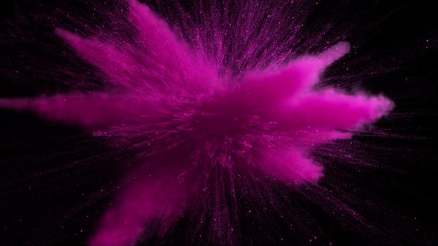 Super slow motion of purple colored powder explosion isolated on black background. Super slow motion 3d render