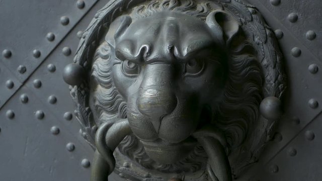 old style lion head door knocker