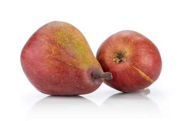 Group of two whole smooth fresh dark red pear anjou isolated on white background