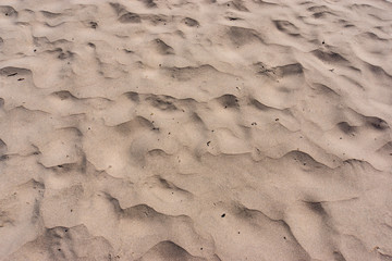 patterns on the sandy beach made by the wind