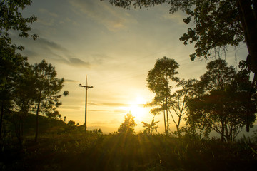 The longitudinal mountains and the setting sun and the forest on Doi Tung