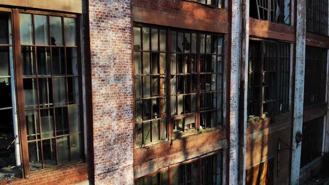 Aerial view on old building with broken windows.