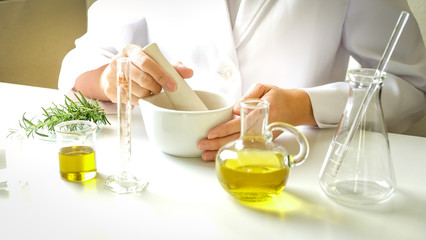 doc tor making herb medicine with herbal the organic natural in the laboratory. oil capsule, natural organic.food nutrition healthy and wellness.