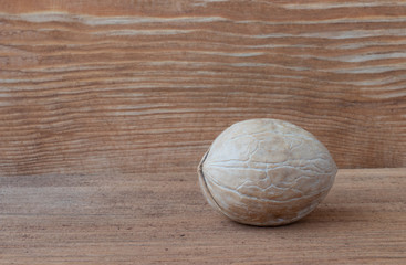 walnut on wooden background