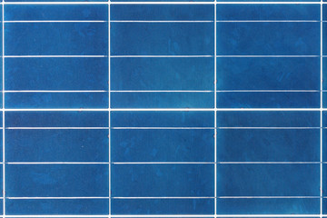 Solar Energy solar cell connections, silicon and encapsulant a nice technology blue pattern. Perspective view of the Poly crystalline silicon Solar Cells around the Solar Panel. Nice textured pattern