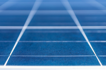 Solar Energy solar cell connections, silicon and encapsulant a nice technology blue pattern. Perspective view of the Poly crystalline silicon Solar Cells around the Solar Panel. Nice textured pattern