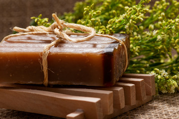 Fresh Aster Solidago Flowers, Wooden Soap Holder and handmade Frankincense & Myrrh Goat's Milk Bar...