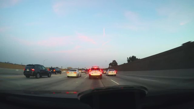 A driving dash cam time-lapse shot of Southern California freeways. 4K Time-lapse.