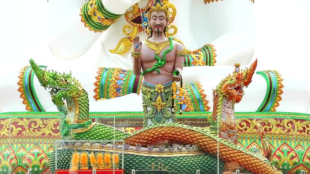 close up to status of Srisuttho god of Naga at Khao Mai Kaew Temple