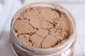 Round jar with chocolate cosmetic
