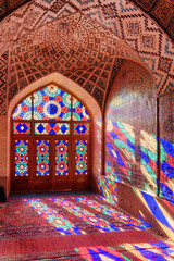 Fototapeta na wymiar Gorgeous view inside the Nasir al-Mulk Mosque in Shiraz, Iran