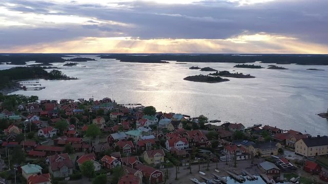 Aerial flight at dusk over the picturesque town of sandhamn on the Stockholm archipelago