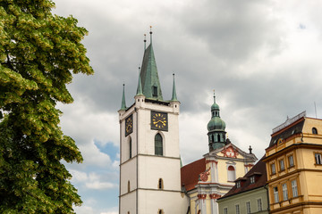 Kamenna vez (Stony tower) with clocks of the Church of All Saints in Litomerice