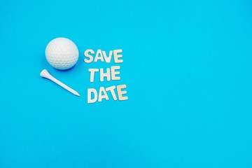 Golf Save the Date with golf ball and tee on blue background