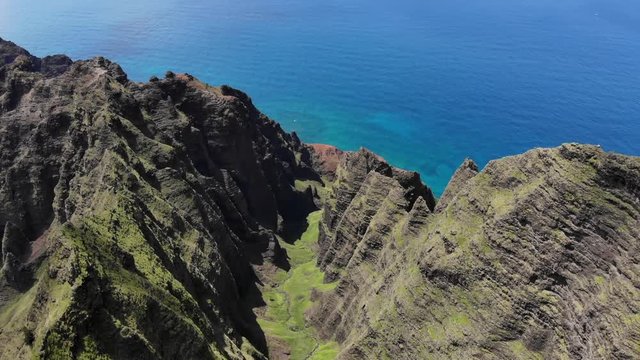 Version Two. Aerial Drone Descending into the Na Pali Coast Mountains and Kalalau Valley in Hawaii.