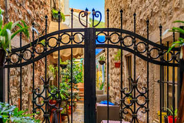 Wrought iron gate in the streets of Old town in Budva Montenegro in the Balkans on the Adriatic Sea
