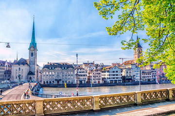 Fototapeta premium View of historic city center of Zurich with Fraumunster Church and river Limmat on sunny day, Canton of Zurich, Switzerland