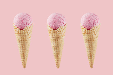 Set of three strawberry ice cream in crisp waffle cones on pastel pink background, mock up for design.