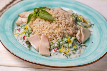 Squid with brown rice and cucumber in yogurt dressing