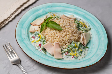 Squid with brown rice and cucumber in yogurt dressing