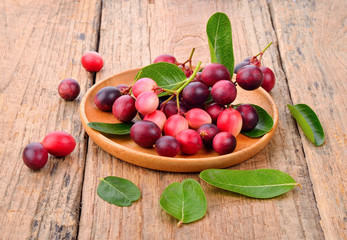 Fresh Carunda on wooden  background