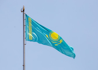 Flag of Kazakhstan against the background of the sky