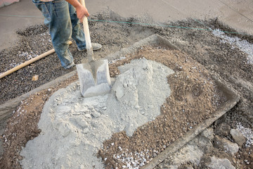 Work pours concrete. Builder pours cement and concrete