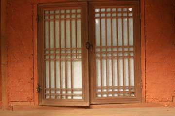 window with wooden shutters
