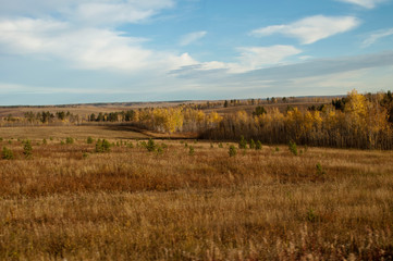 Fototapeta premium Rural Siberia Russia, view of grasslands and fields between Irkutsk and Lake Baikal