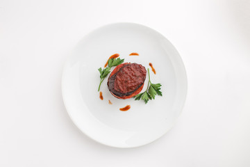 Parmigiana di melanzane baked eggplant with tomato isolated on white background