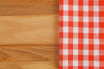Tablecloth on wooden table background 