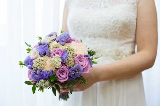 Wedding bouquet in bride's hands