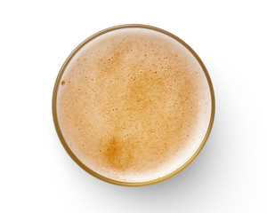 top view of beer bubbles in glass cup on white background.