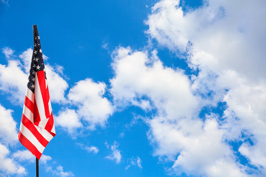 American Flag On Blue Sky