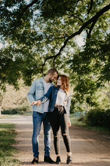 Fototapeta premium Happy loving couple outdoor in park .