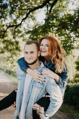 Naklejka premium Happy loving couple outdoor in park .