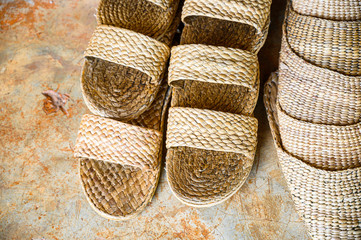 Weave shoes arrange on the floor (wallpaper)
