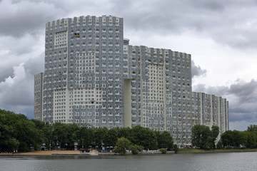 Fototapeta na wymiar Residential buildings on the banks of the picturesque Moscow river on a summer day, Russia