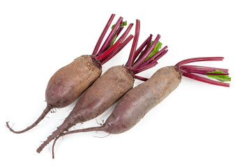 Uncooked young red beetroots on a white background