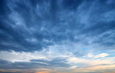 Naklejka na ściany i meble Dramatic sunset and sunrise sky with cumulus clouds.