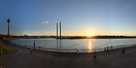 Fototapeta na wymiar Beautiful sunset over the Rhine / Rhein river near Düsseldorf, Germany
