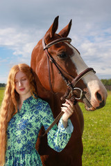 Obraz premium Woman with her horse at sunset, autumn