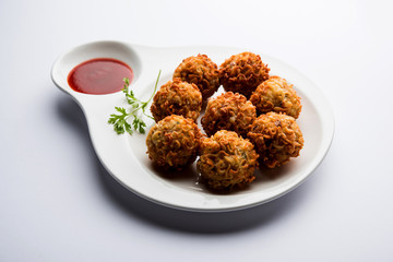 Crispy Noodles/maggie Pakora or pakoda is a popular indochinese street food served with ketchup