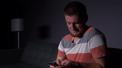Caucasian Male on Phone in Apartment Living Room