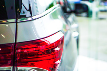 Taillight or rear light of new modern technology car in showroom